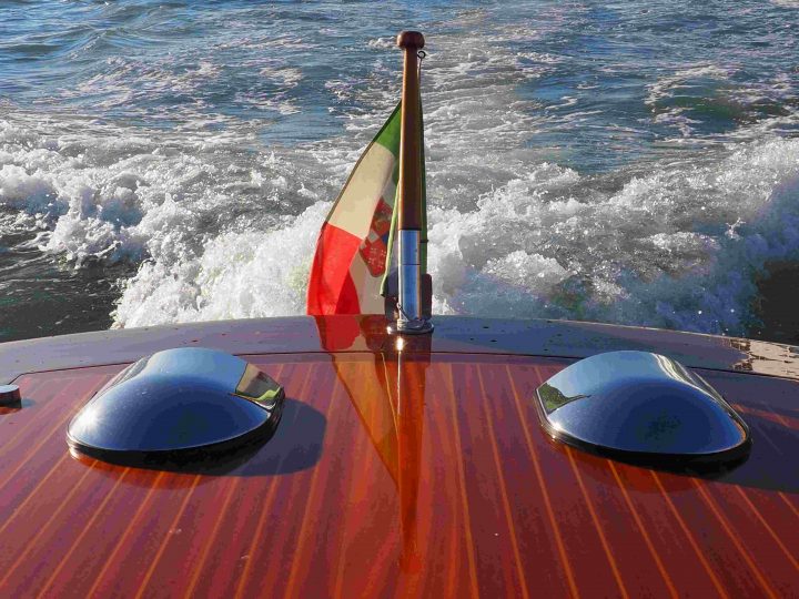 private water-taxi with Italian navy flag