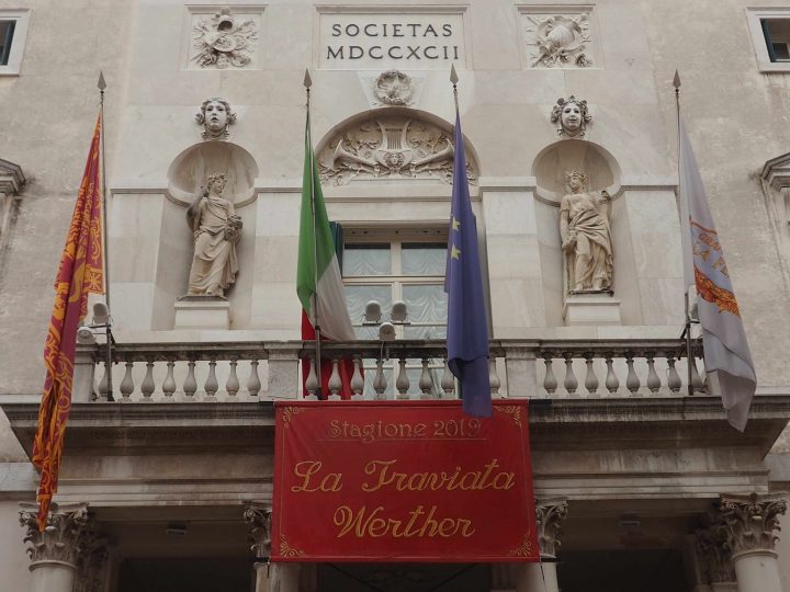 Neo-Classical façade with statues of Muses of Tragedy and Dance of the La Fenice Theatre