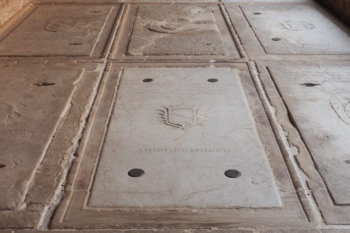 example of tombs on the floor of the cloister